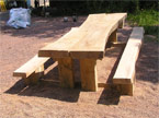 An end-on view of one of the banquet tables, showing exhaustive attention to detail