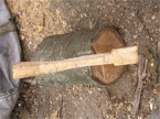 Axe seemingly stuck in a log from the top