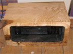 An amplifier sits inside the finished cube