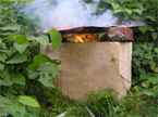 Plumes of smoke come from the burnt cube
